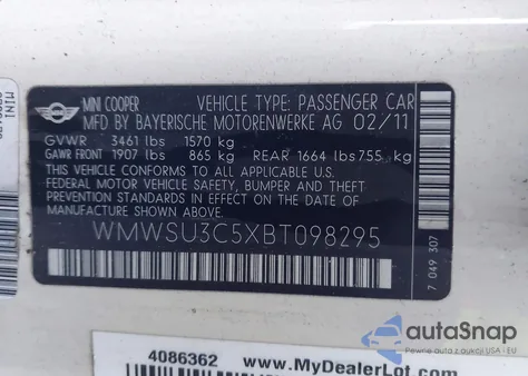 2011 Mini Cooper z USA, uszkodzony, nr VIN WMWSU3C5XBT098295